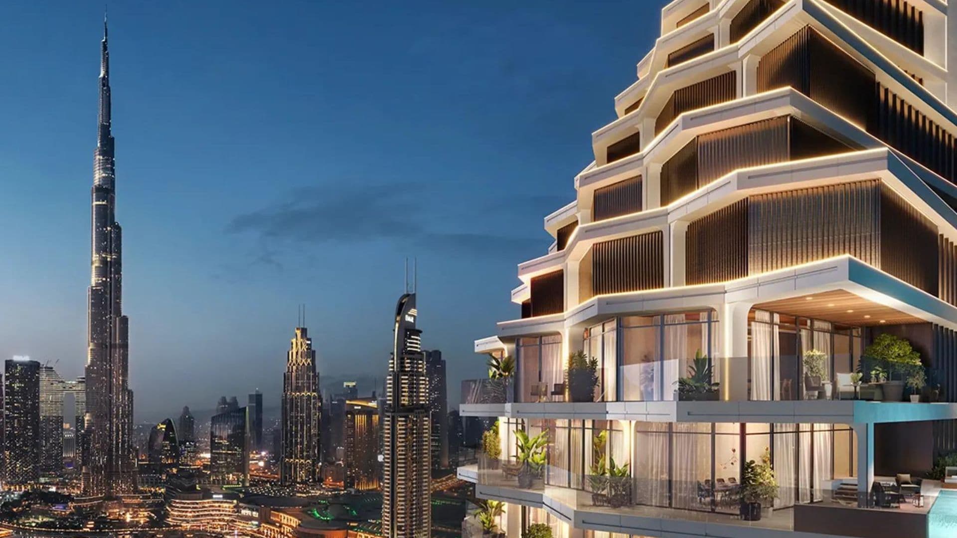 Luxury Downtown Dubai apartment terrace at dusk with the Burj Khalifa on the skyline